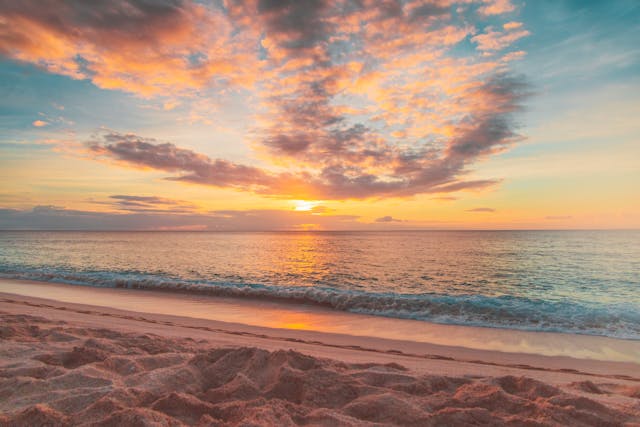 a sunset at a beach